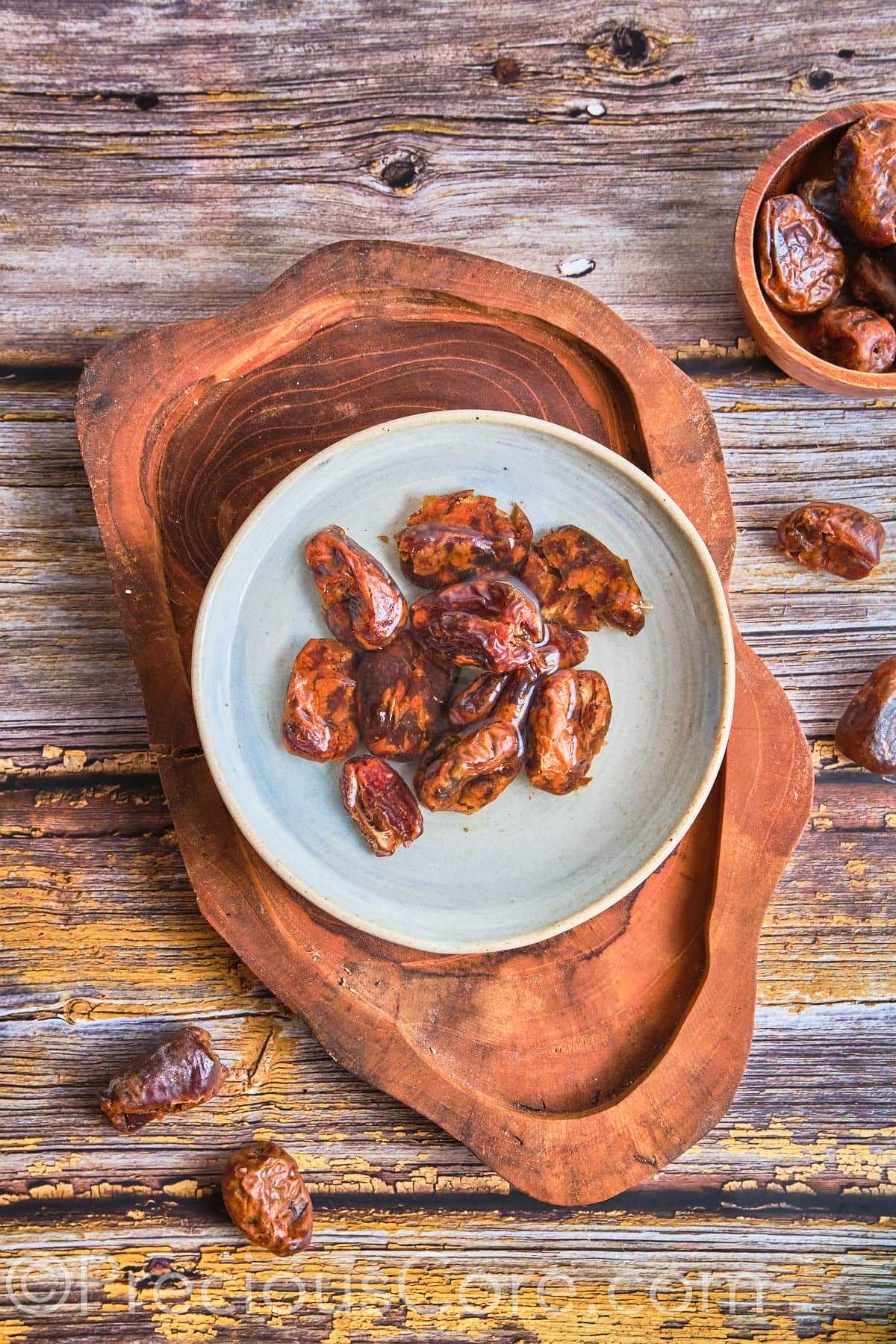 Dates soaking in a bowl of water.