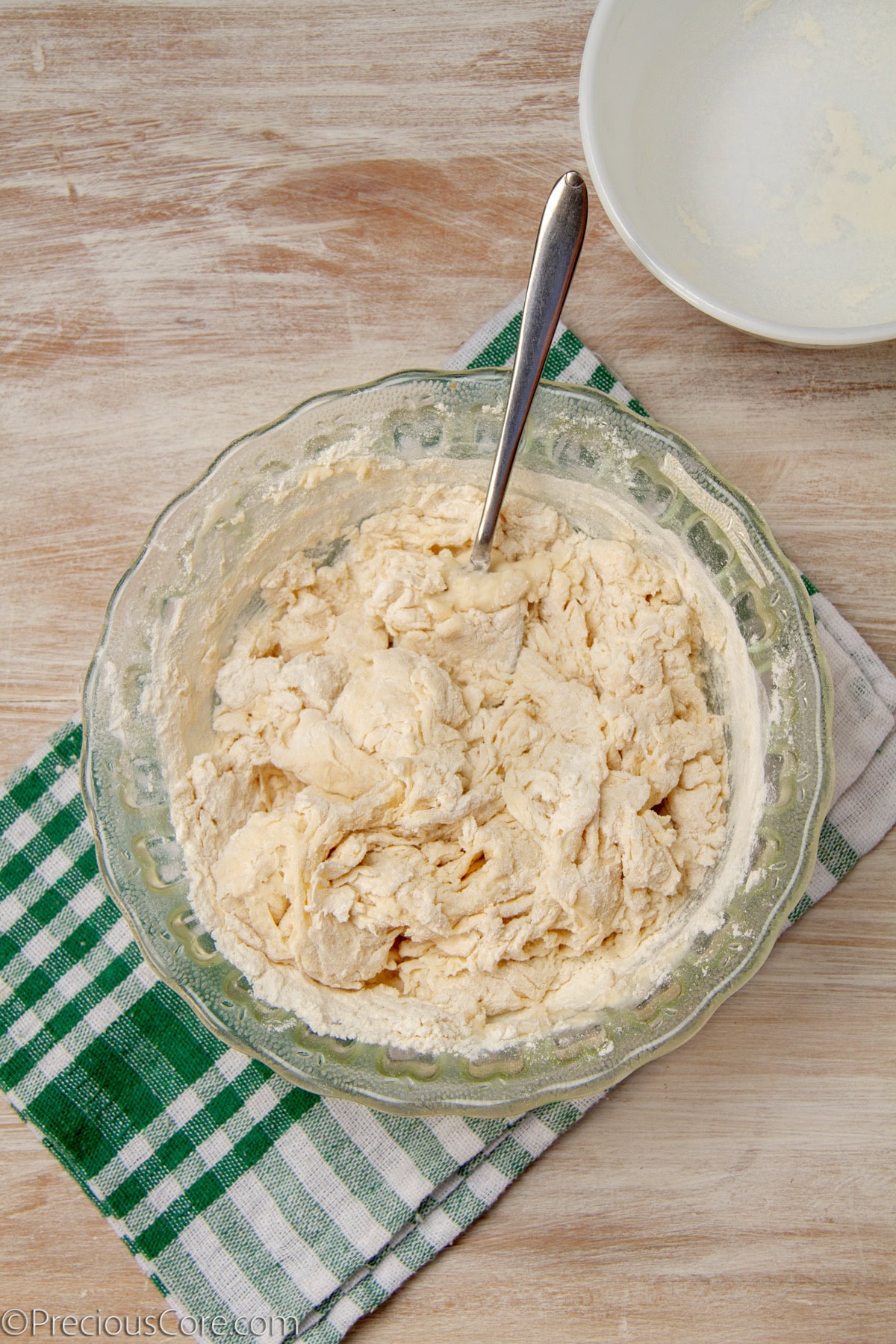 Mixing homemade pizza dough.