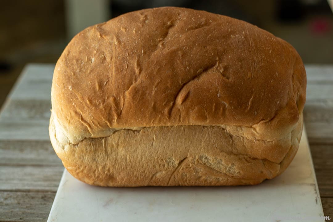 Loaf of sandwich bread on a marble board.