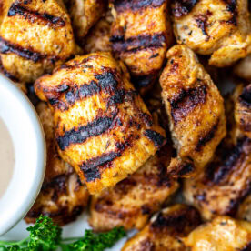 Chicken nuggets with grill marks.