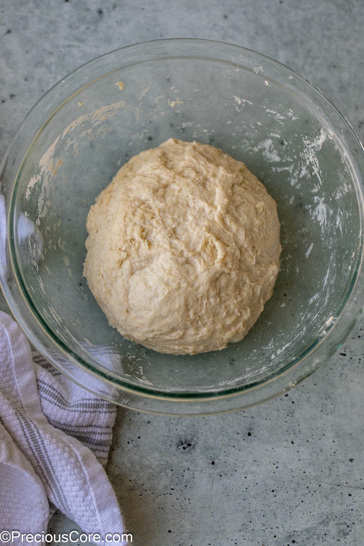 Flatbread dough in a bowl.