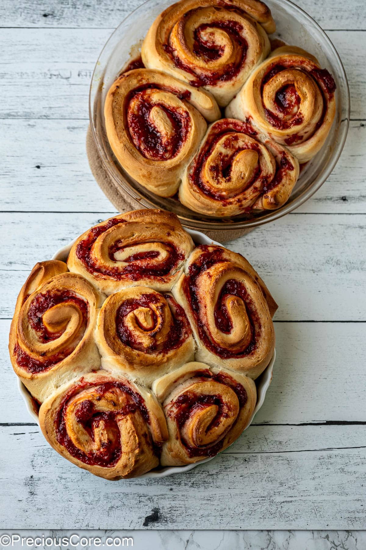 Baked golden brown strawberry cinnamon rolls.