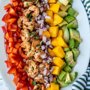 Diced mango, cooked shrimp, avocado, and bell peppers.