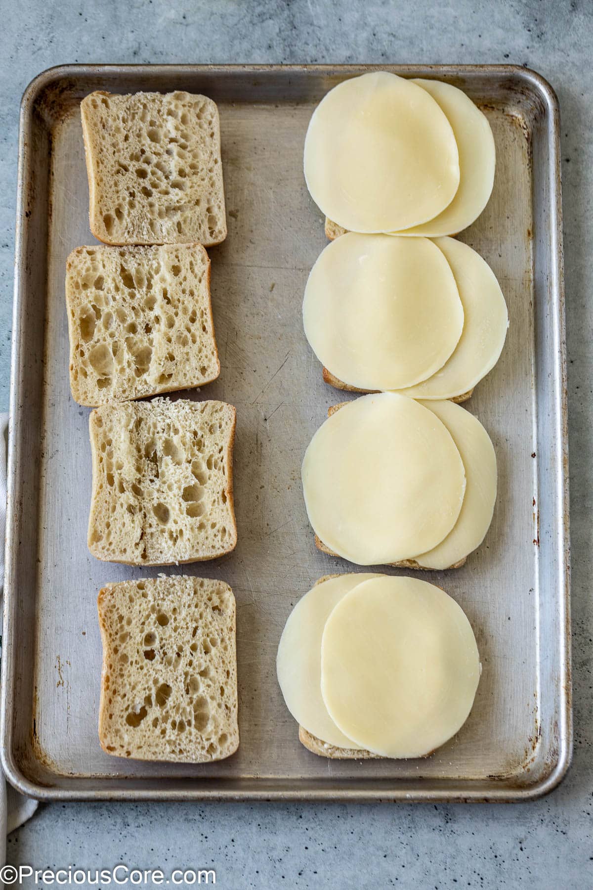 Ciabatta sandwich bread and cheese slices.