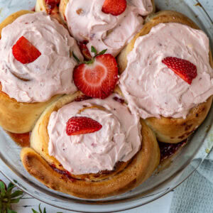 Frosted strawberry cinnamon rolls.