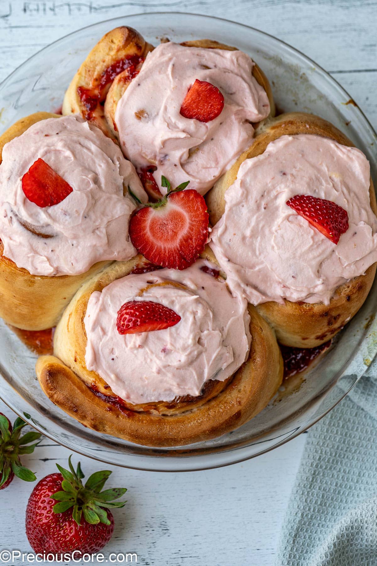 Frosted strawberry cinnamon rolls.