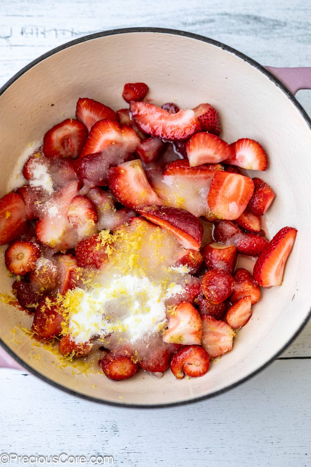 Fresh ingredients for strawberry compote.