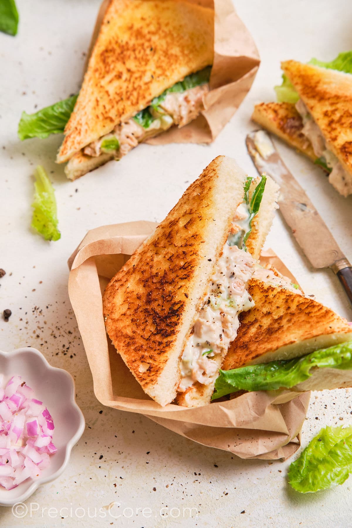 Chicken Mayonnaise Sandwiches cut into triangles.