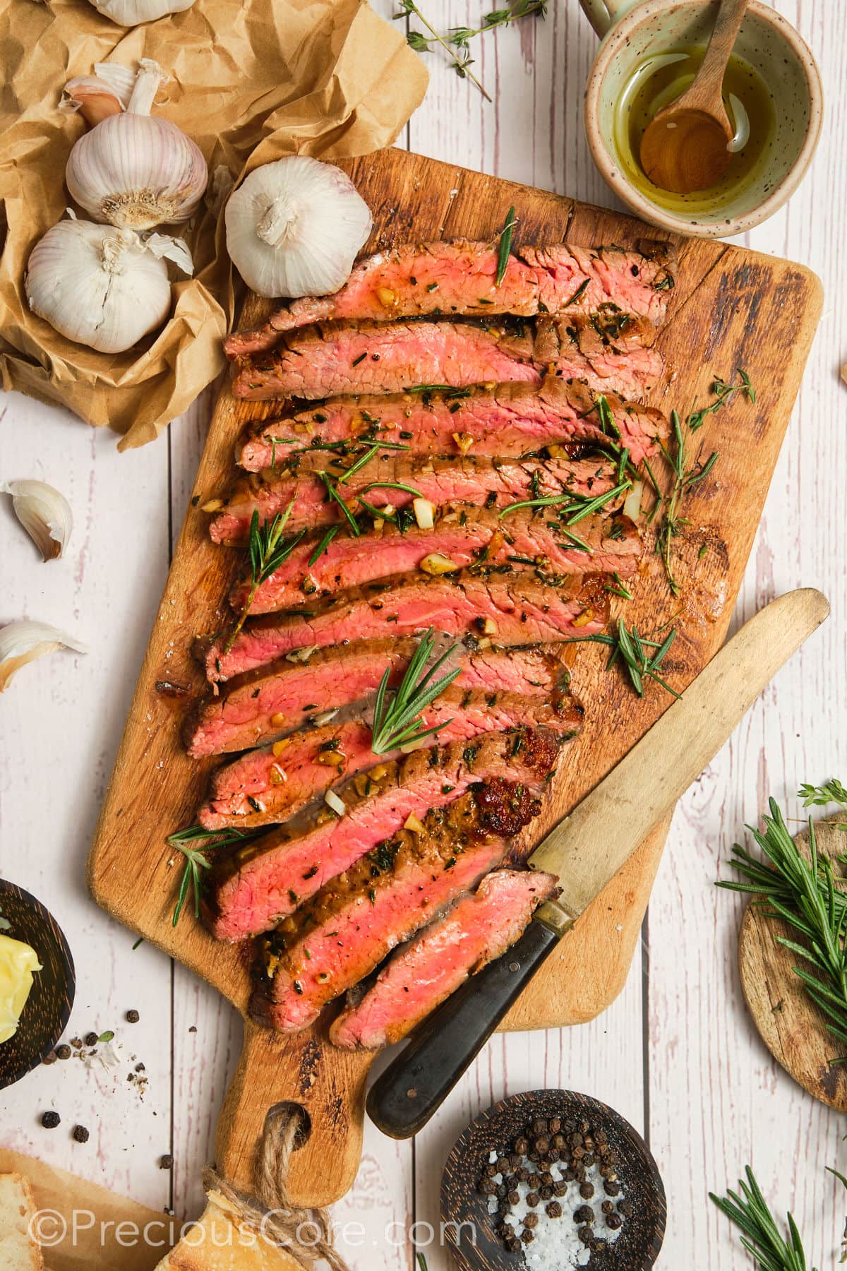 Sliced meat that is pink in the middle.