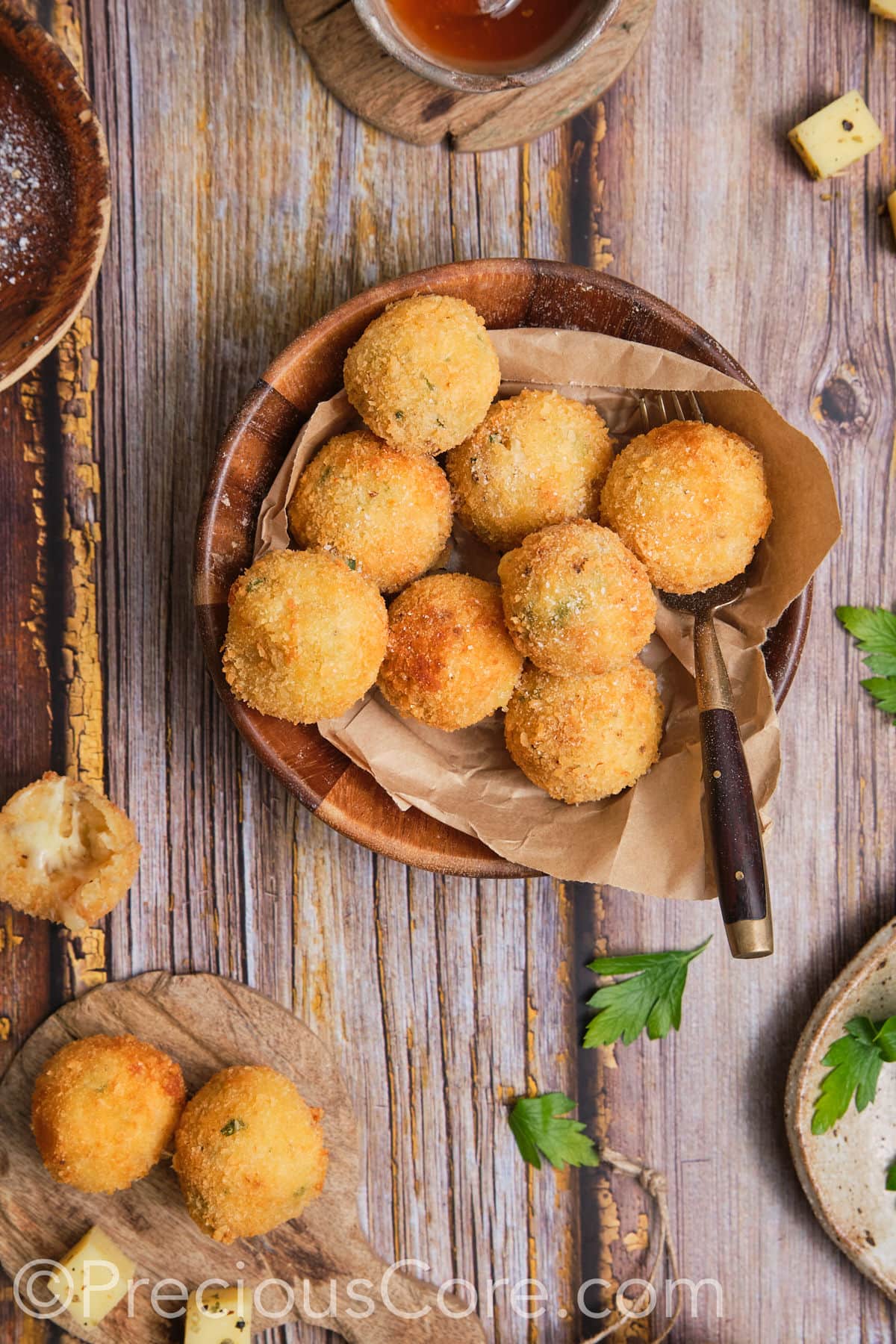 Golden brown balls of fried mashed potatoes.