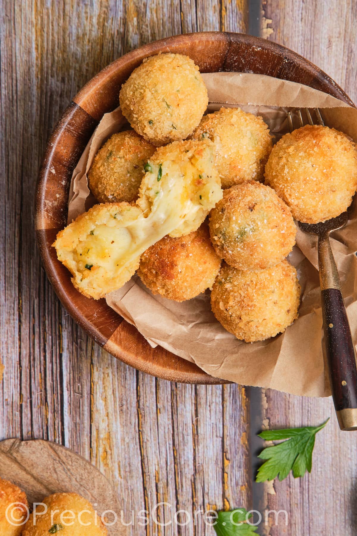 Cheese potato balls in a wooden bowl.