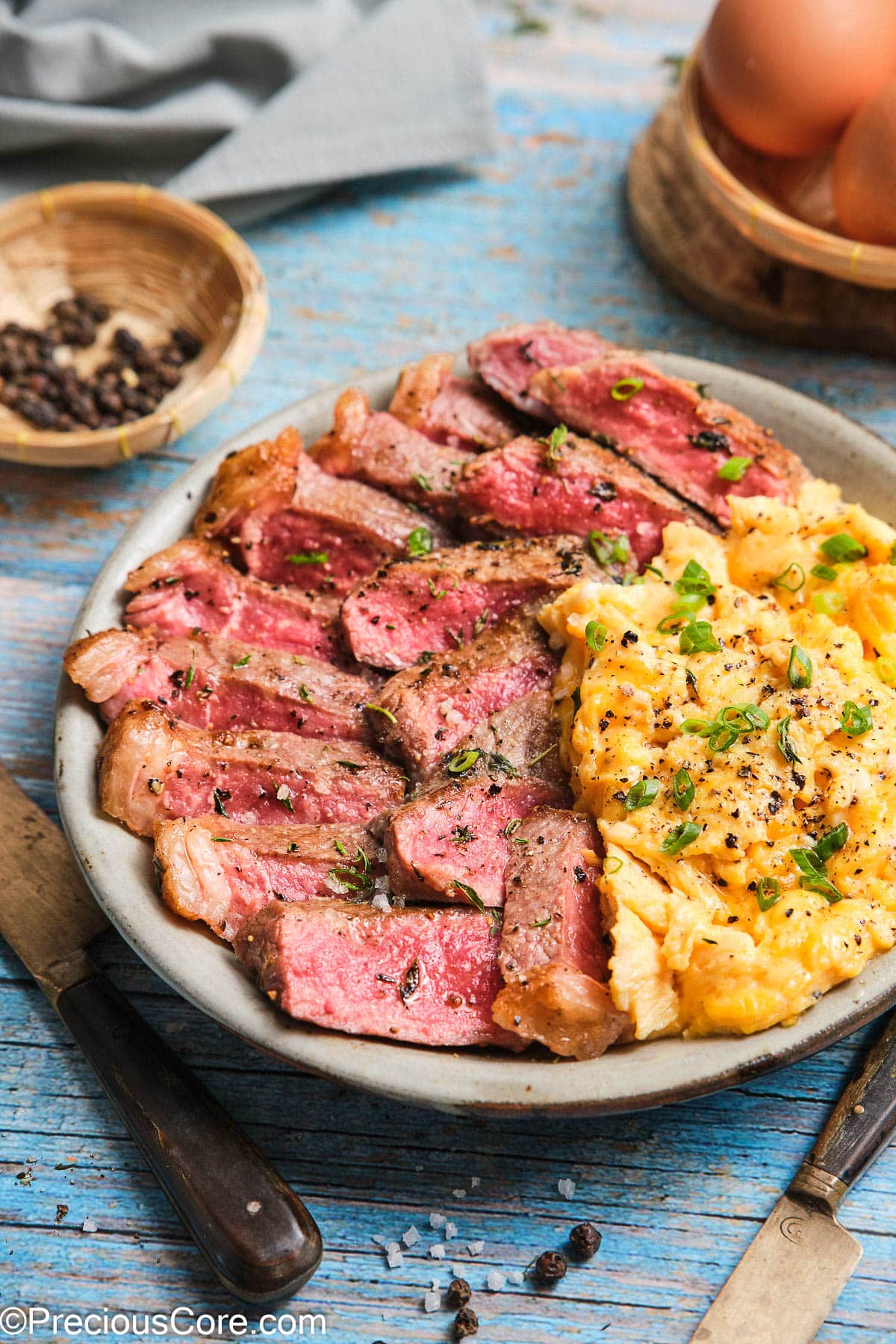 Close-up of homemade steak and eggs.