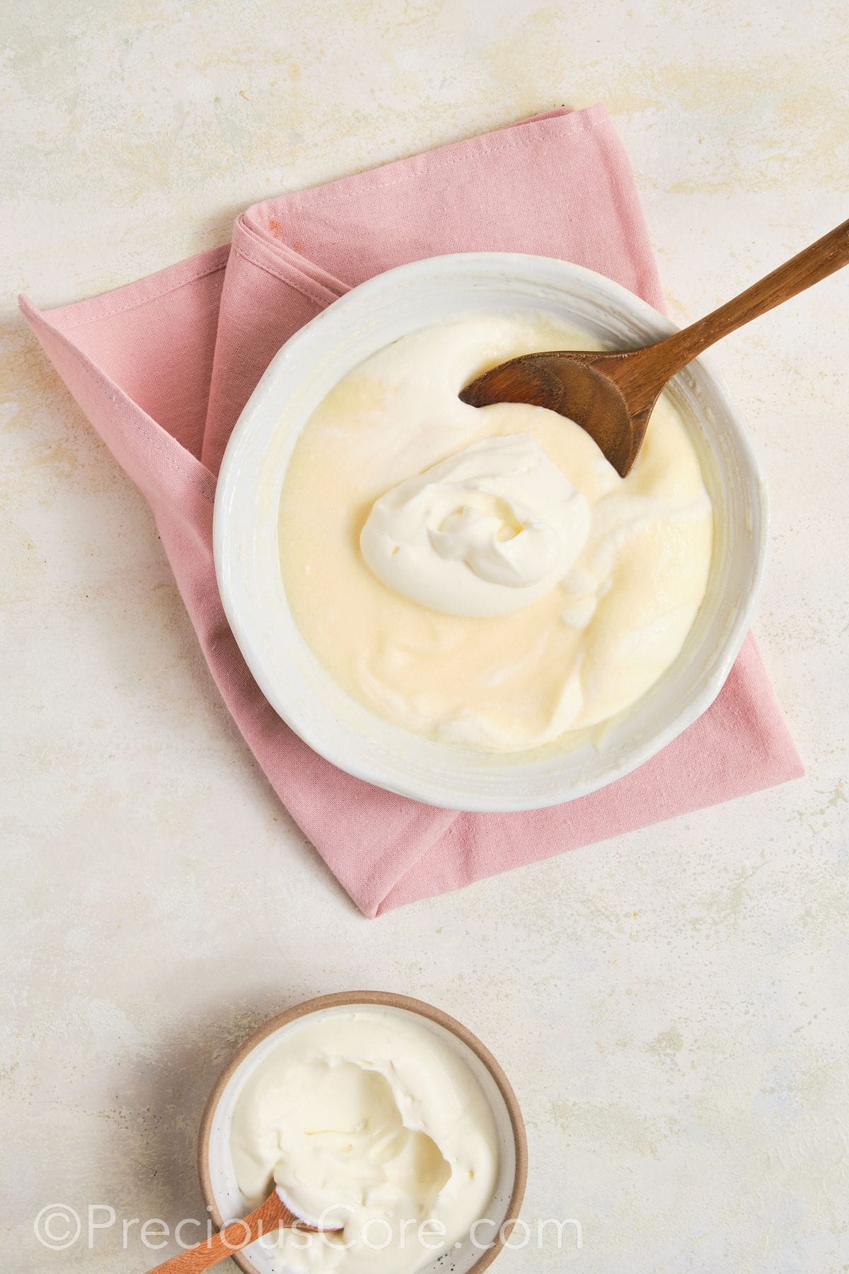 Folding whipped topping into banana pudding mix.