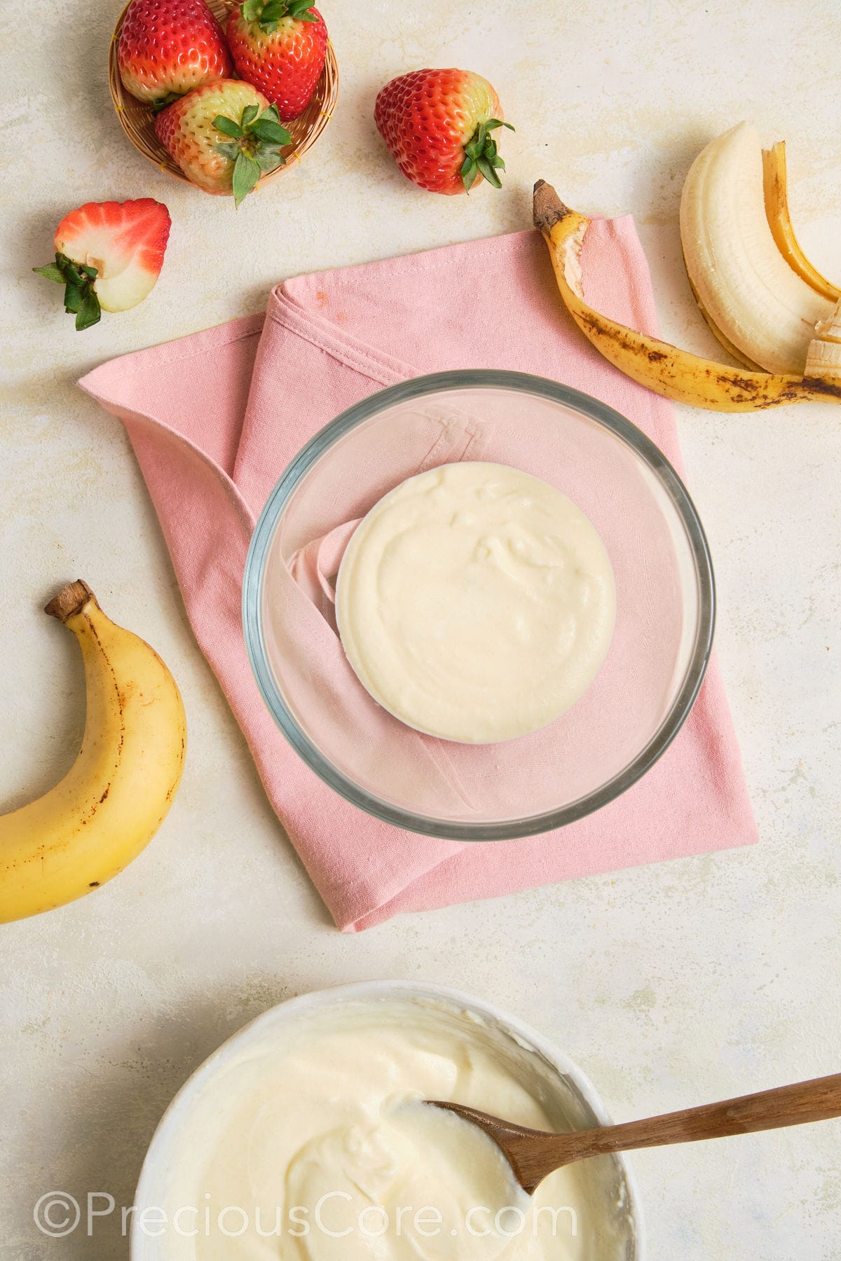 Vanilla pudding covering the bottom of a trifle bowl.