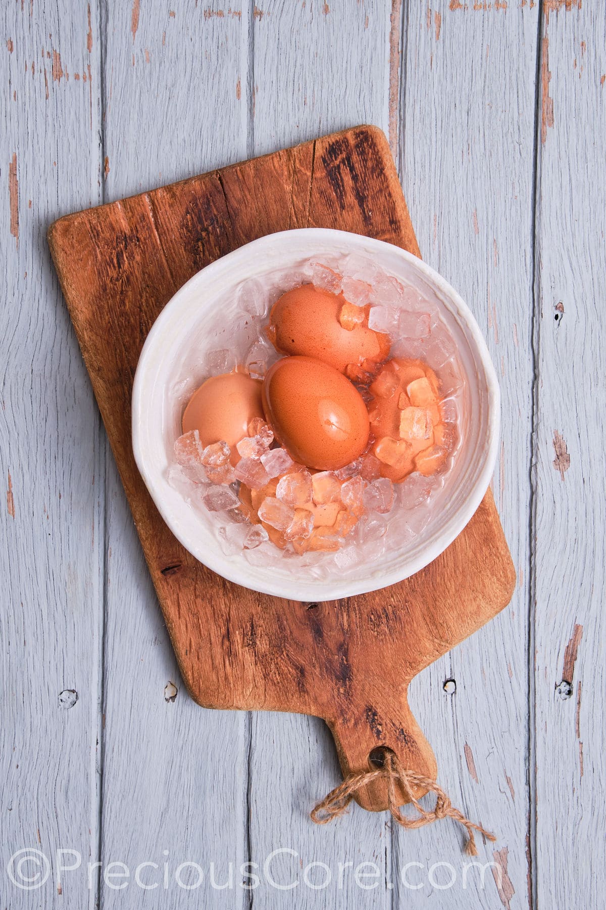 Boiled eggs in a bow filled with ice. 