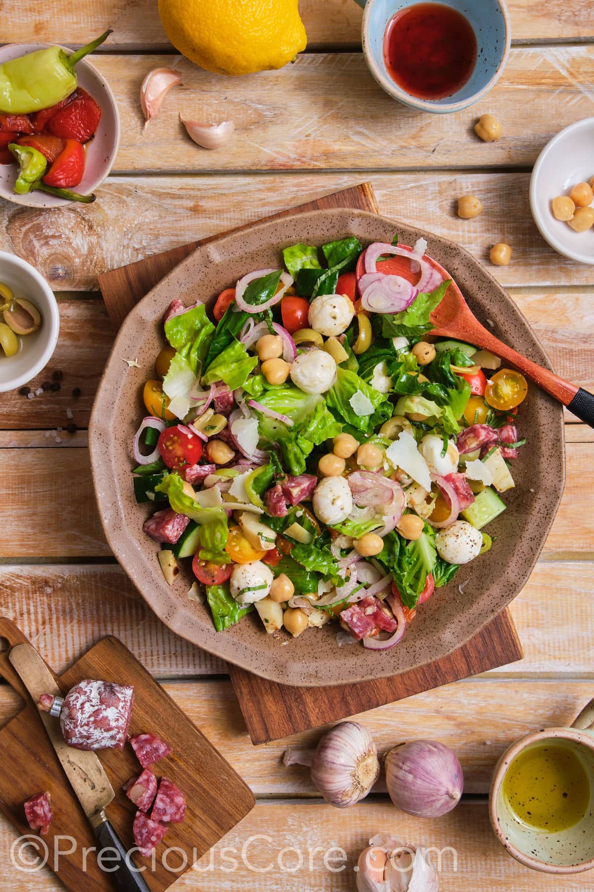 Chopped salad in a brown bowl.