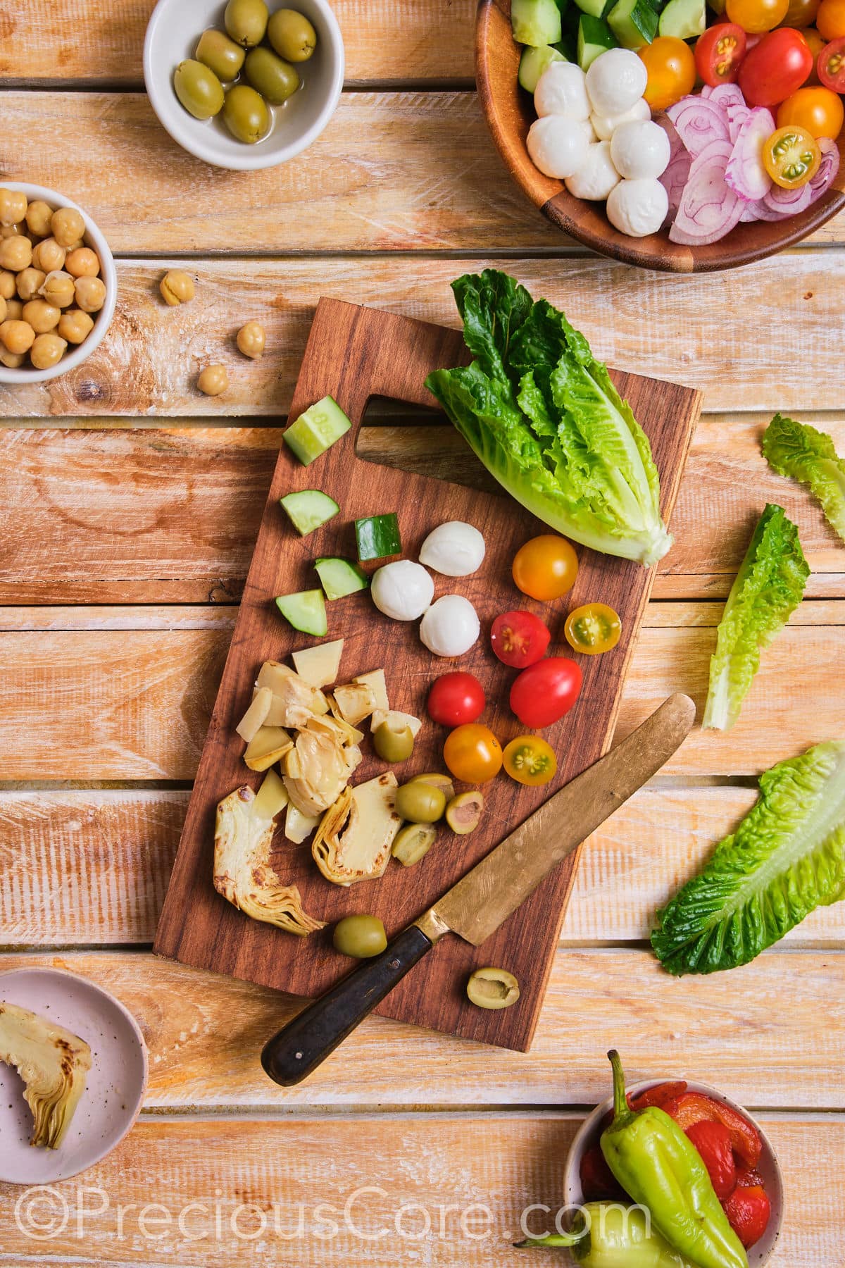 Chopping veggies on a cutting board.