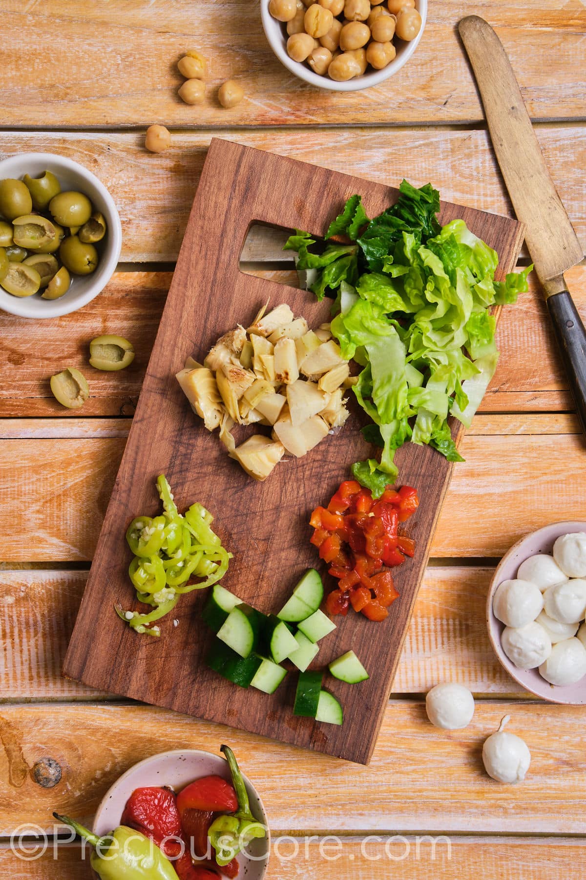 Diced vegetables on a chopping board.