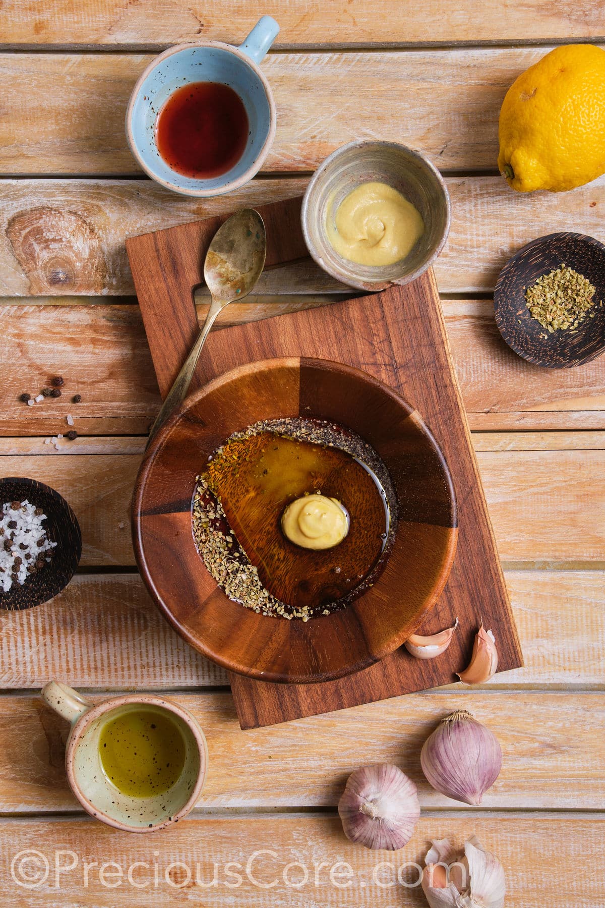 Salad dressing ingredients in a bowl.