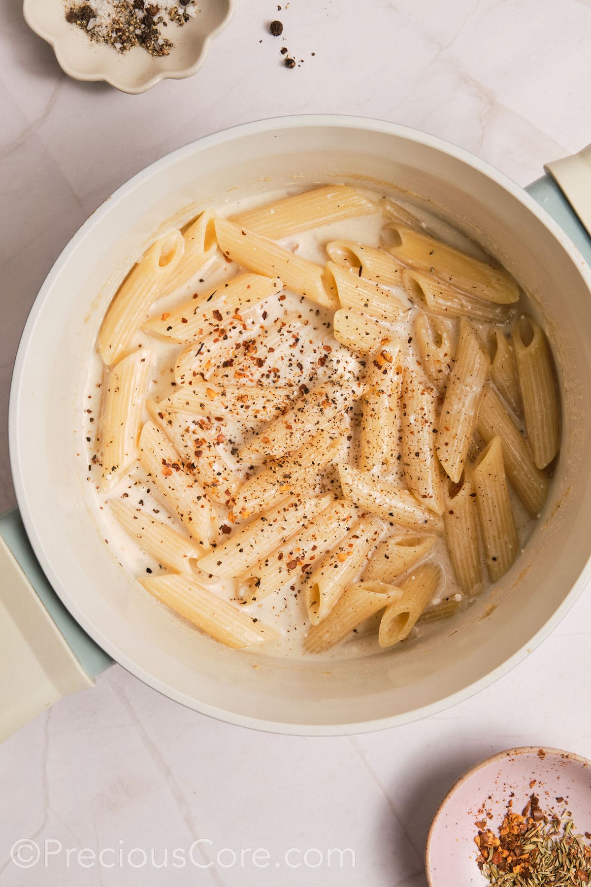 Seasoning added to one pot creamy pasta.