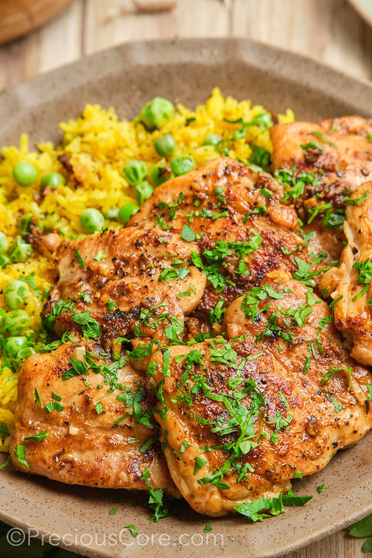 Close-up of pan-seared boneless chicken thighs.