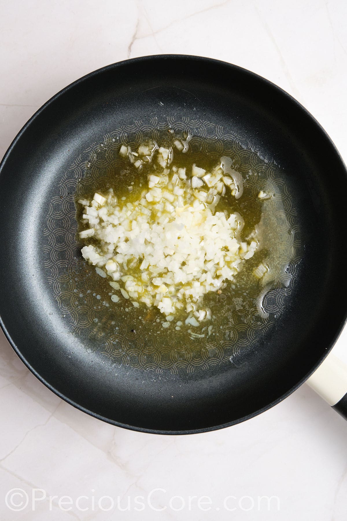 Onions frying in oil.