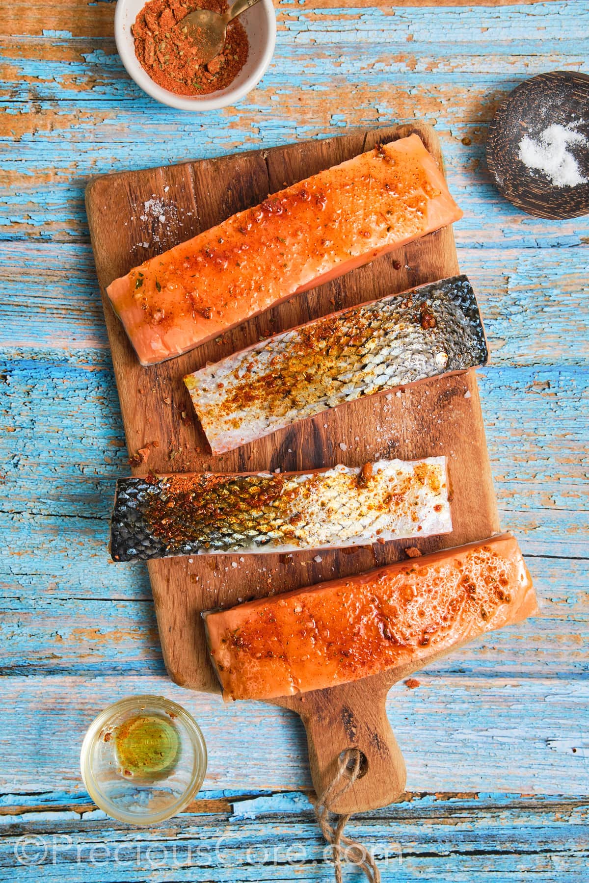 Salmon coated with seasoning.