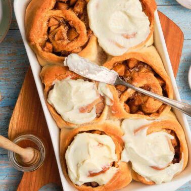 Square image of cinnamon rolls.