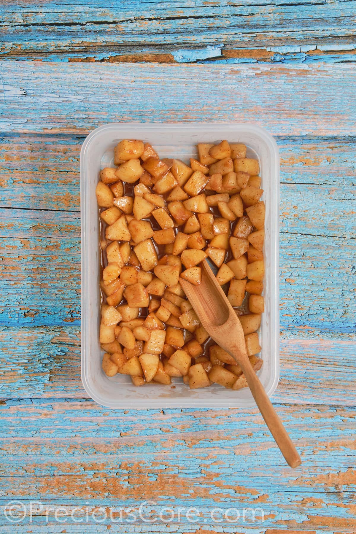 Cooled apple pie filling in a bowl.