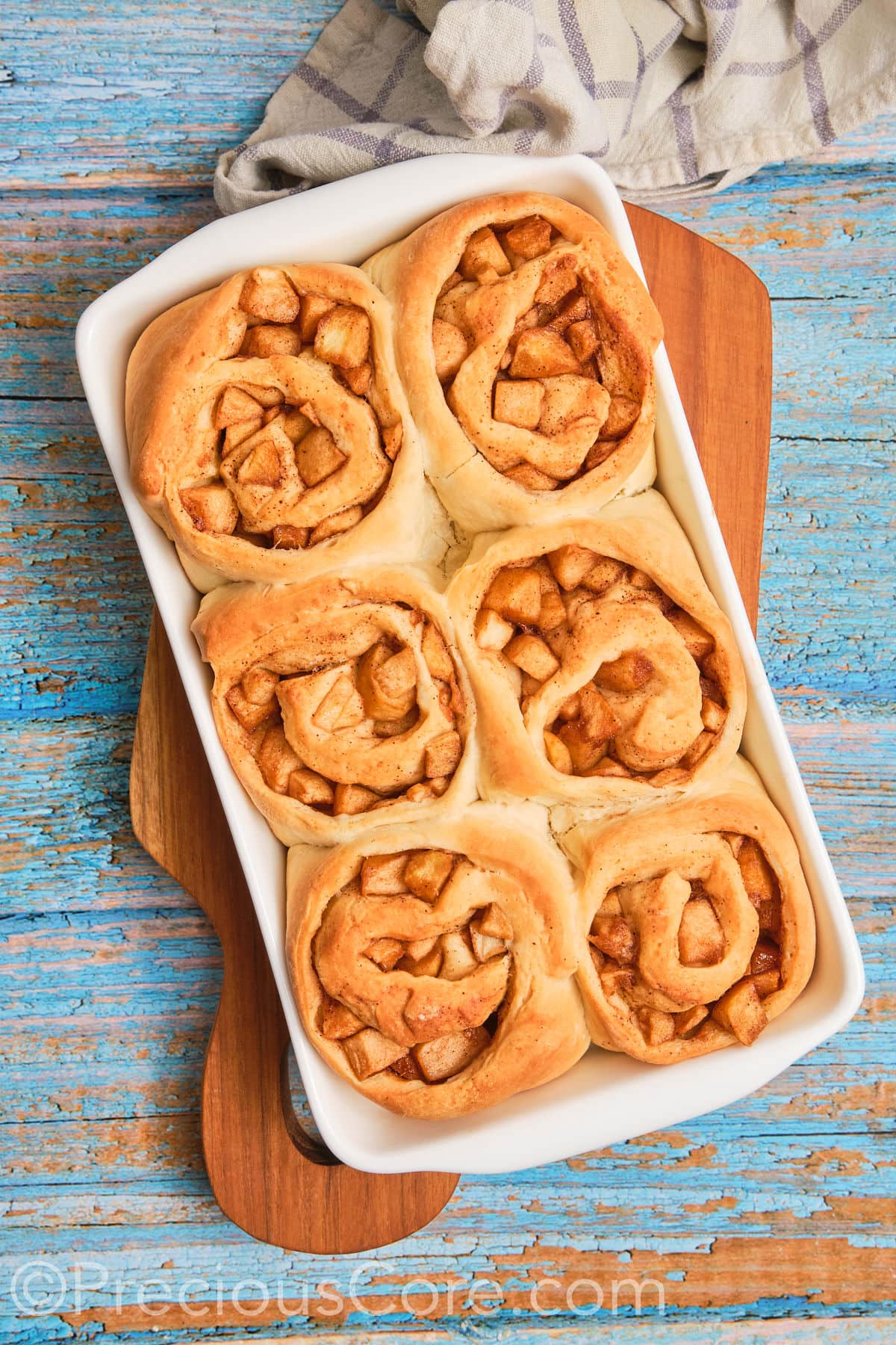 Baked Cinnamon Rolls With Apple Pie Filling.