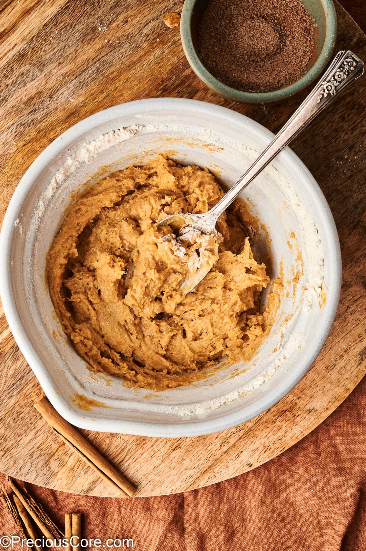 Pumpkin spice donut batter in a bowl.