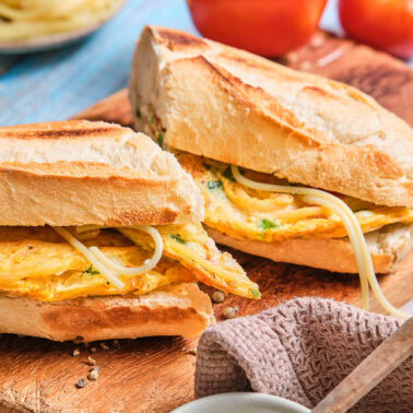 Square image of spaghetti omelette sandwich.