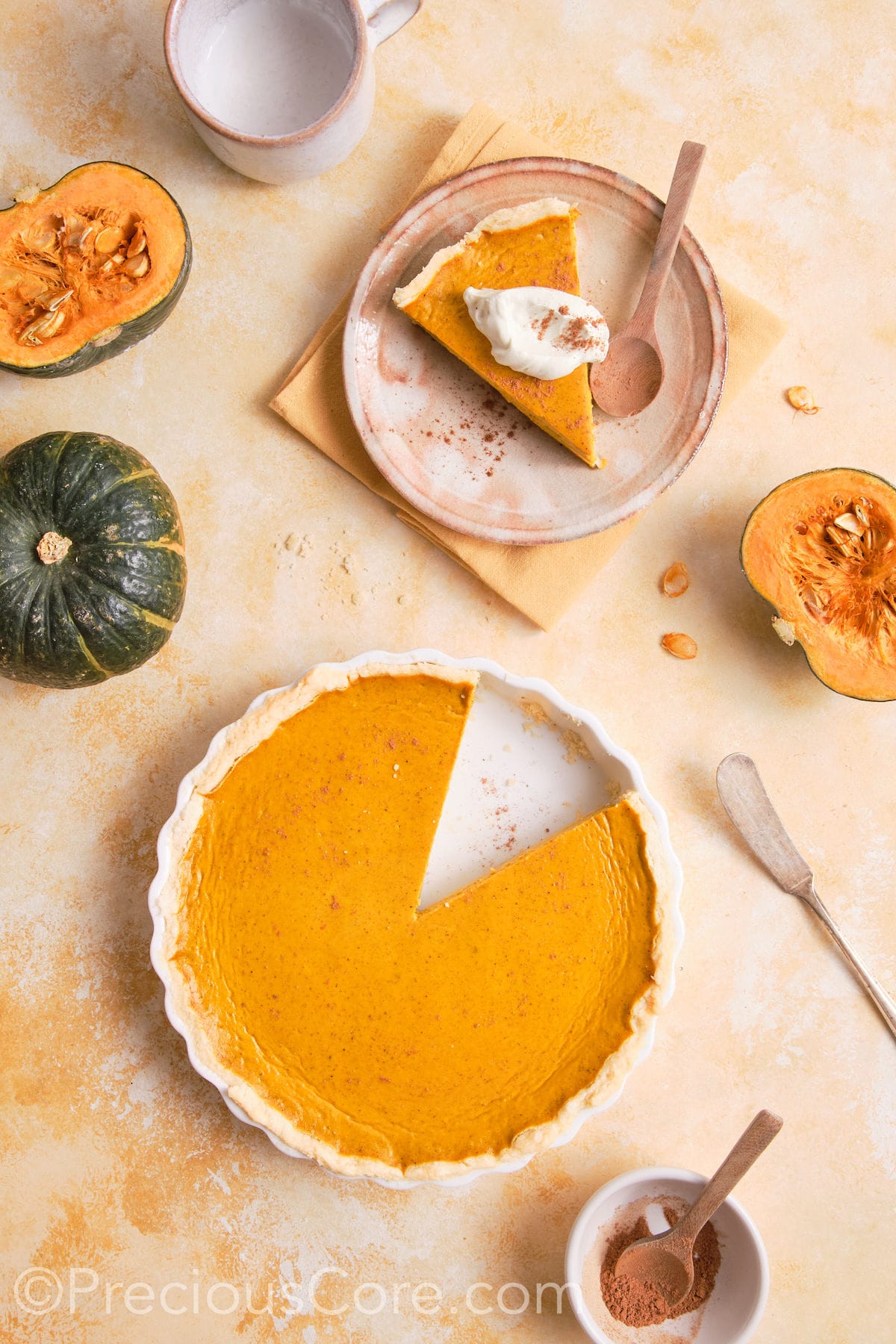 Pumpkin pie no evaporated milk in a white pie dish.