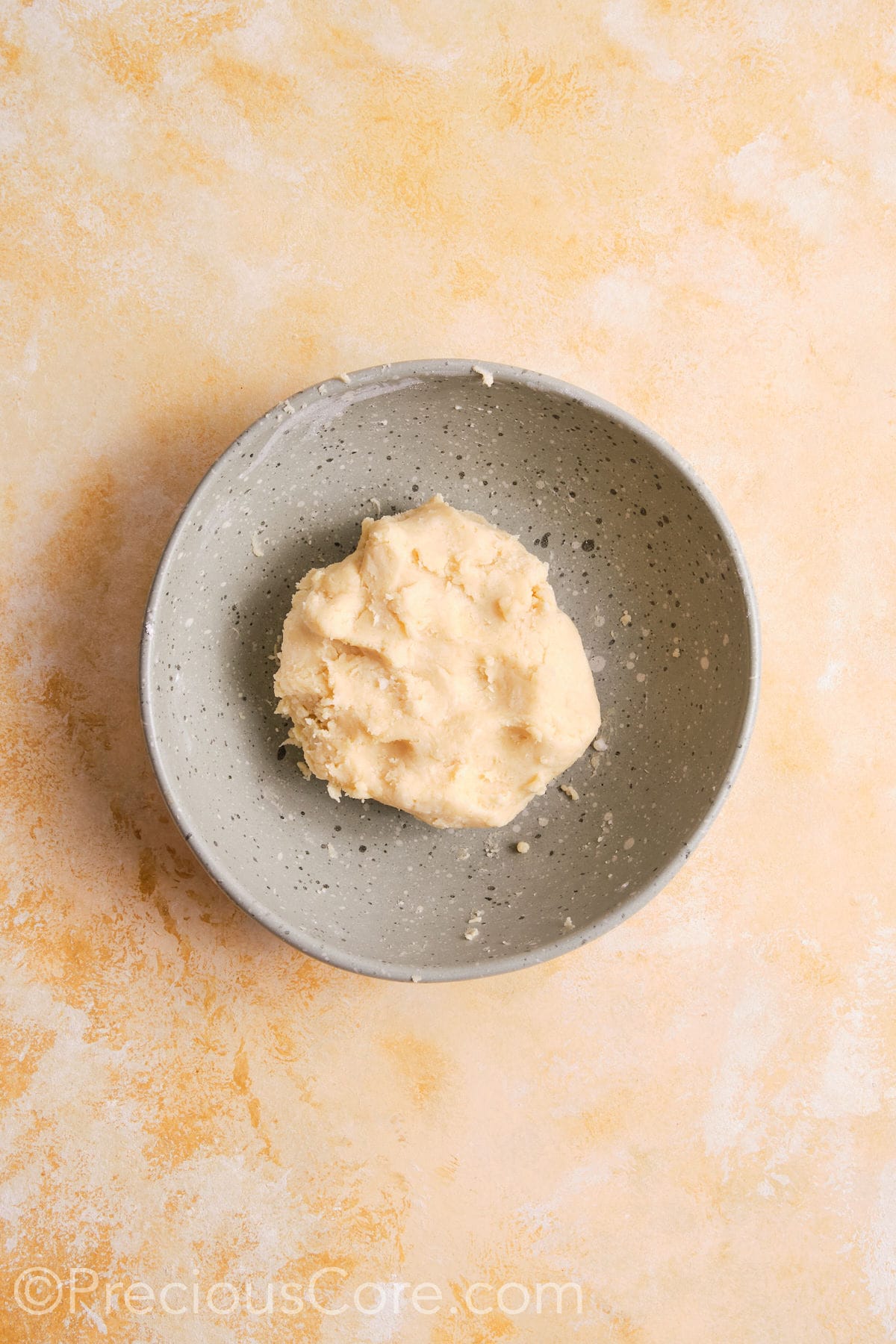 Pie crust dough coming together.