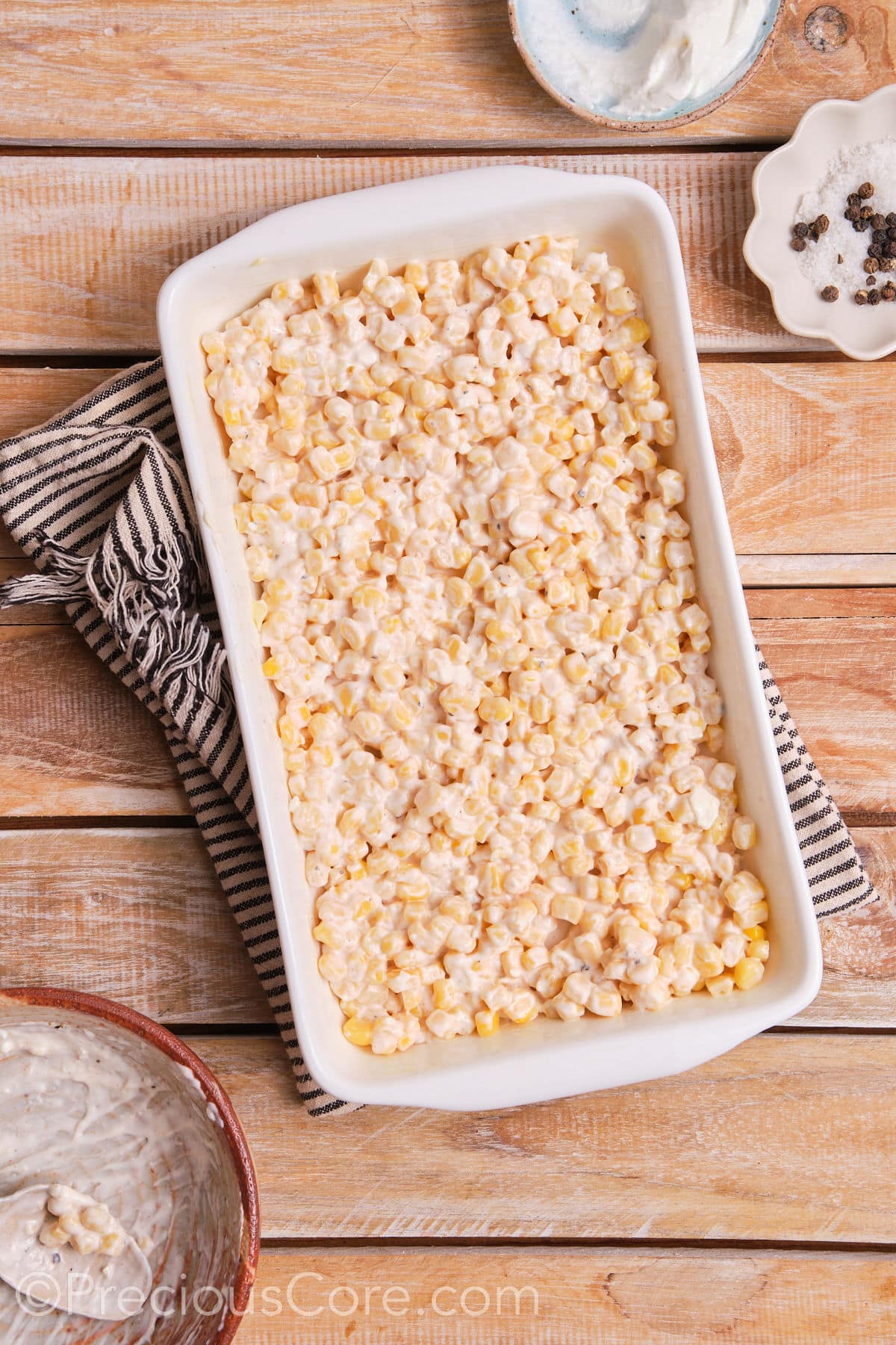 Creamy corn in a baking dish.