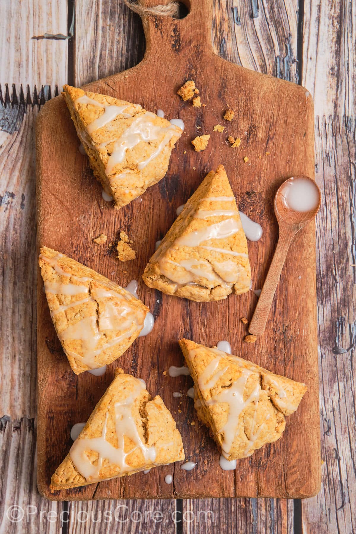 Scones with white glaze drizzled on top.