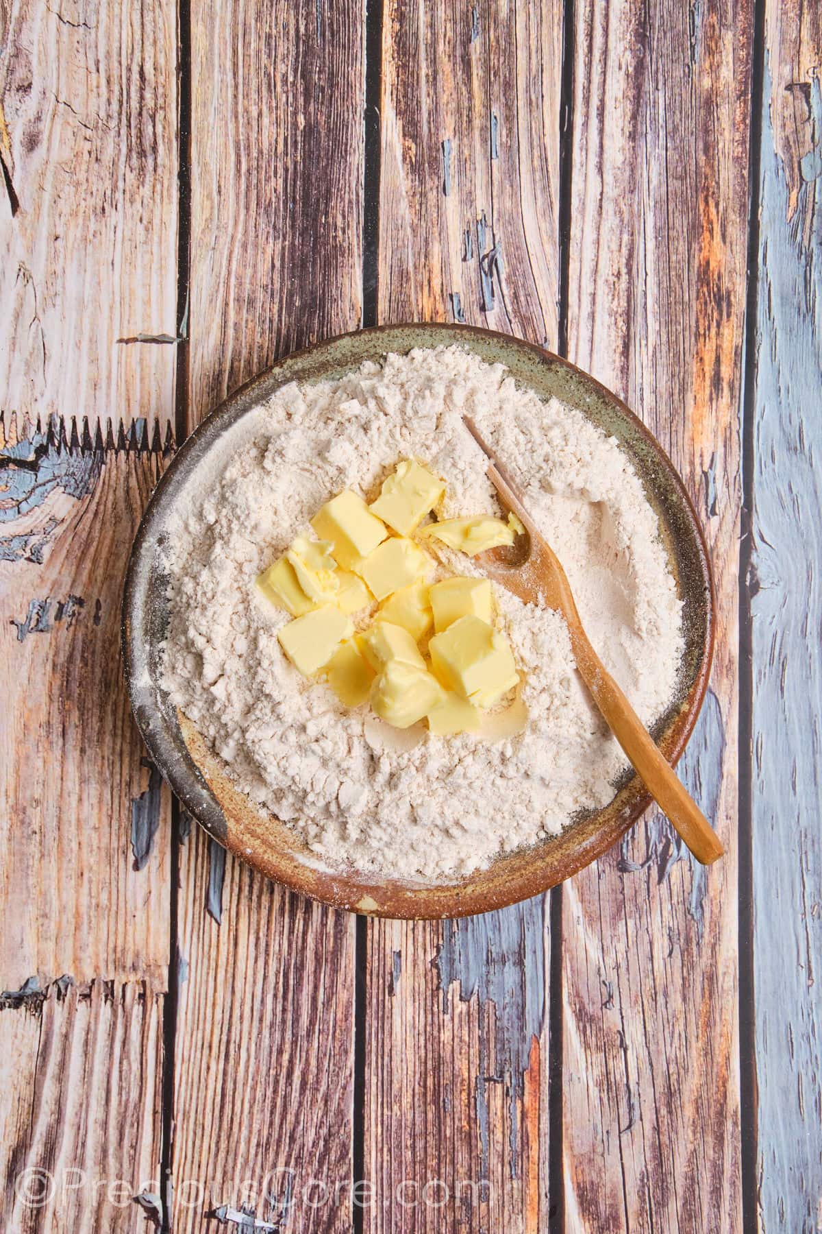 Cold butter added to flour mixture.