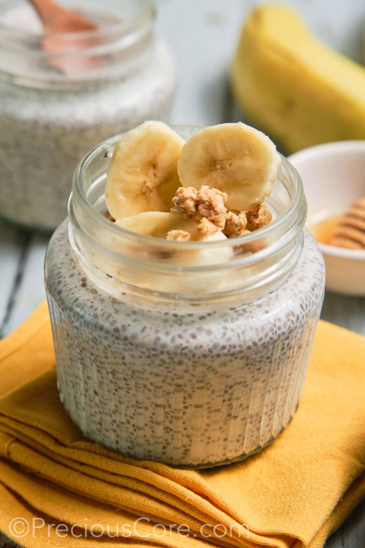 Close-up of a jar of banana chia pudding.