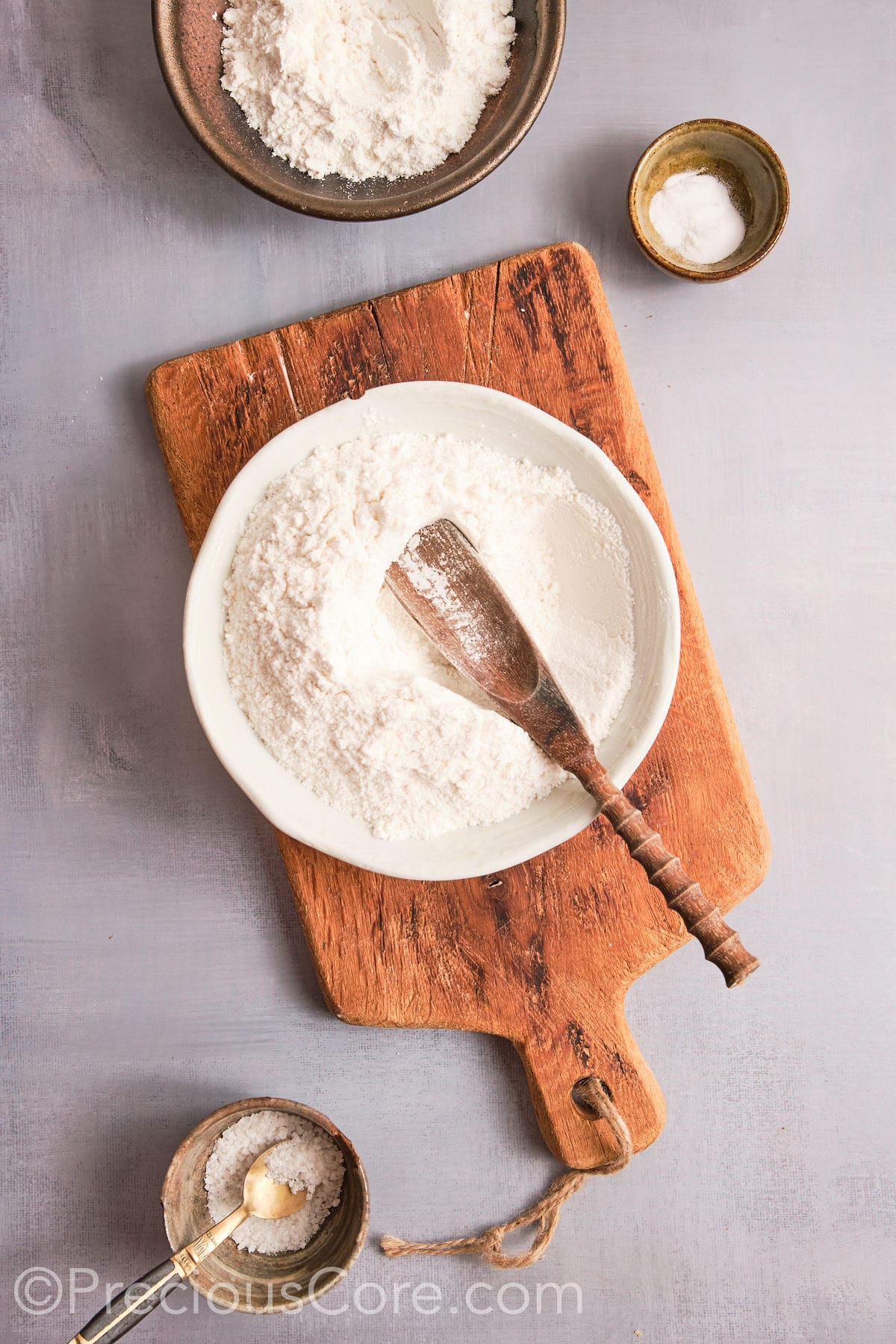 Mixing all the dry ingredients in a bowl for cookies.