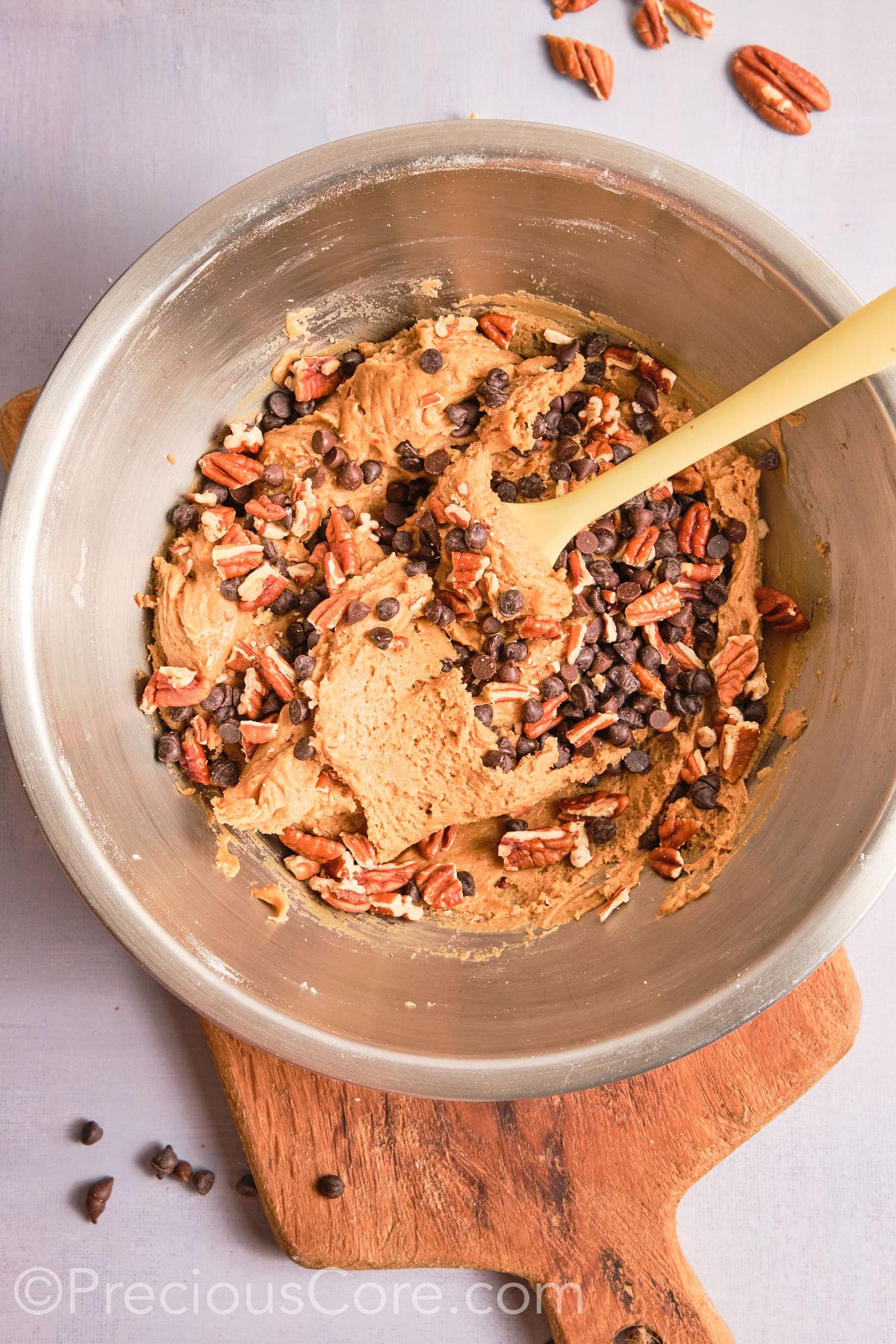 Chopped pecans and dark chocolate chips added to the cookie dough. 