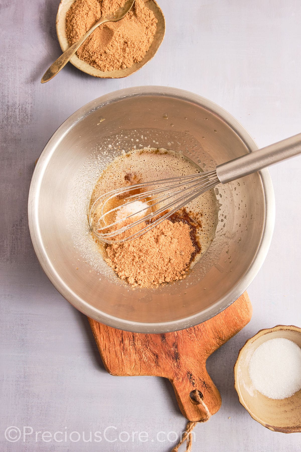 Adding brown sugar to the brown butter mixture. 