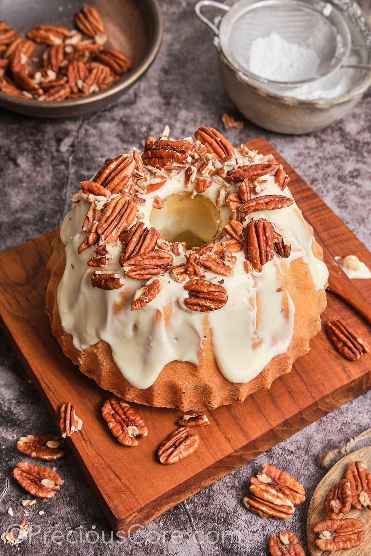 Delicious Butter Pecan Pound Cake on a wooden plank