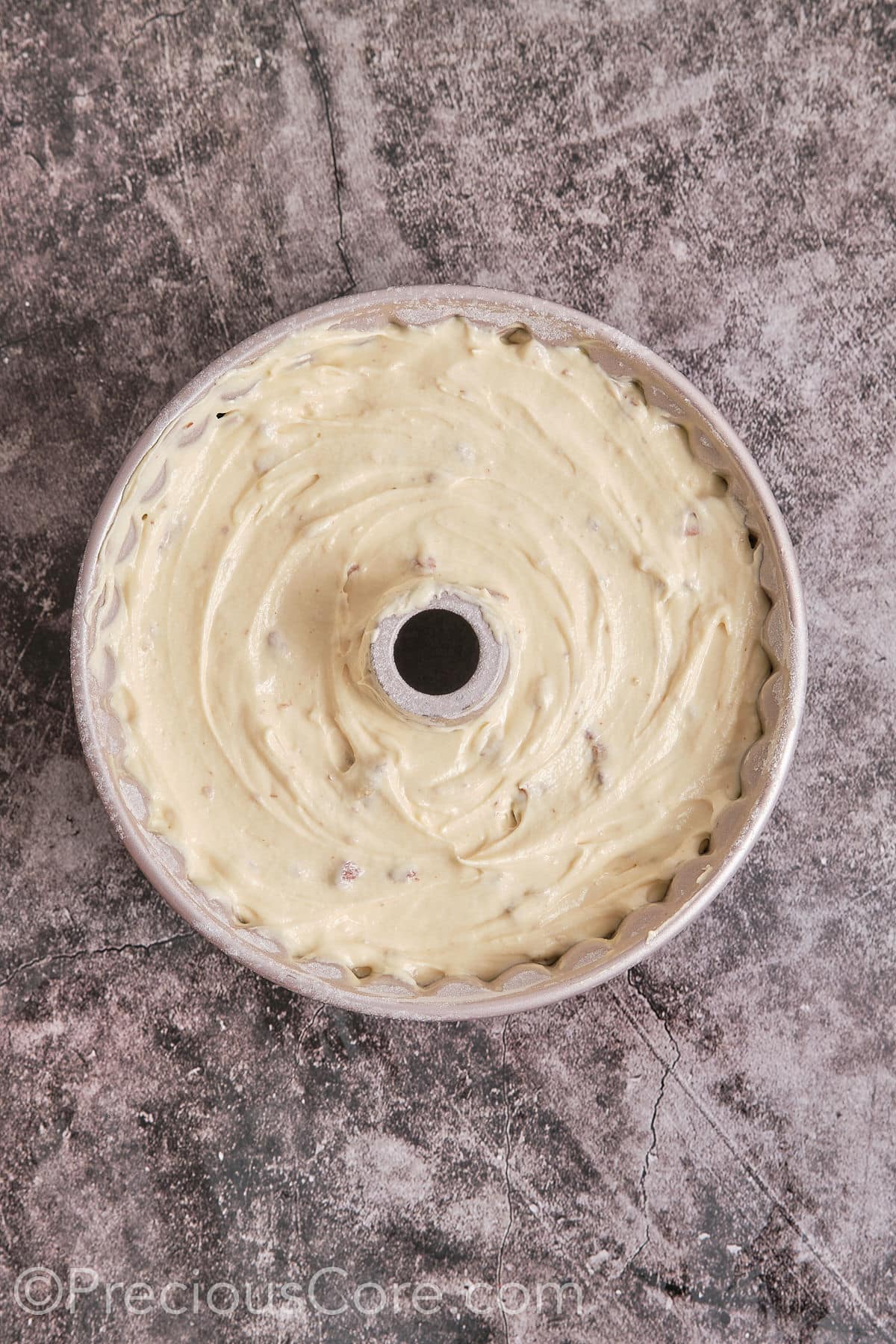 pour the batter into the prepared Bundt pan