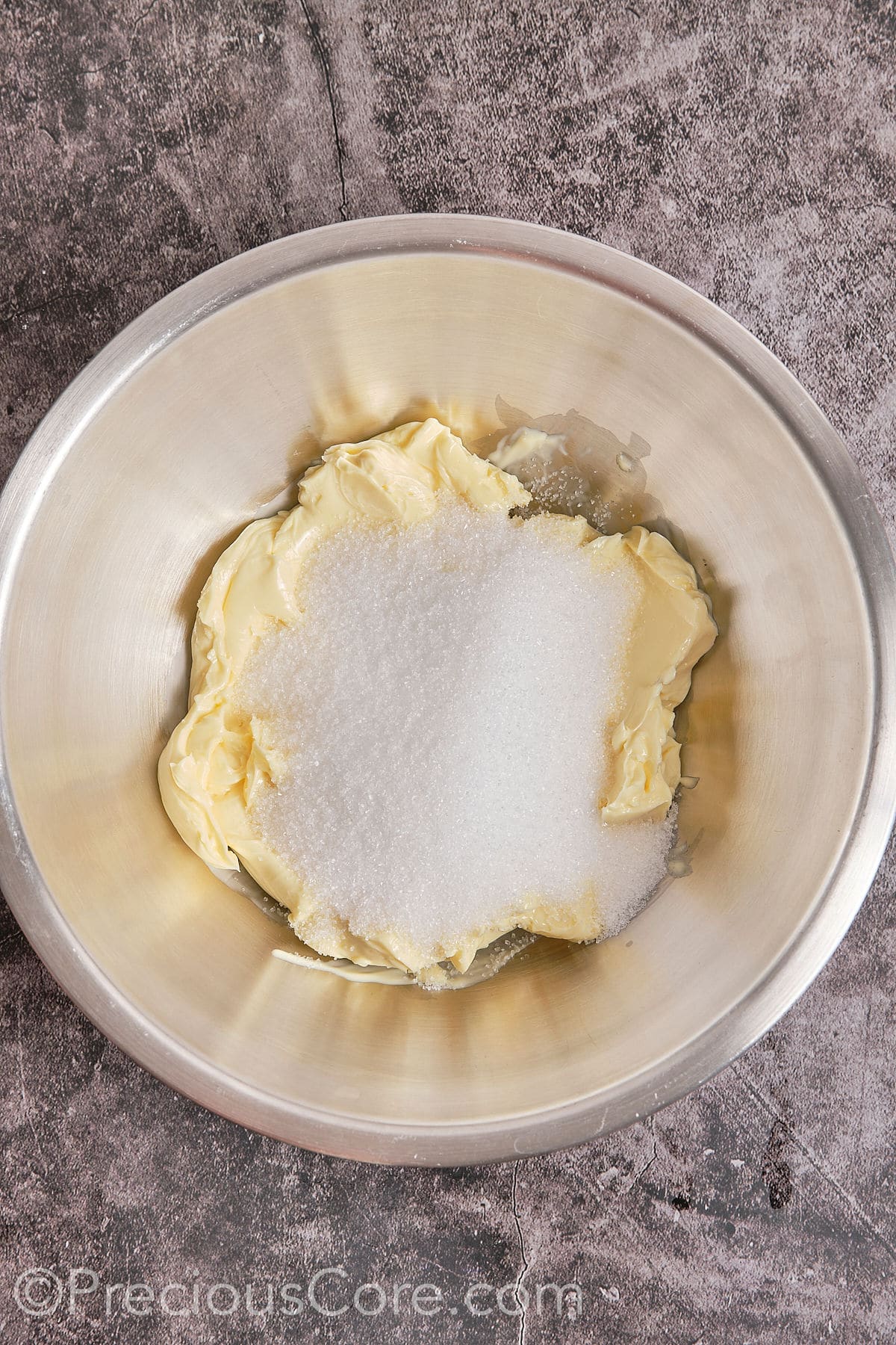 Cream butter and sugar in a huge vessel