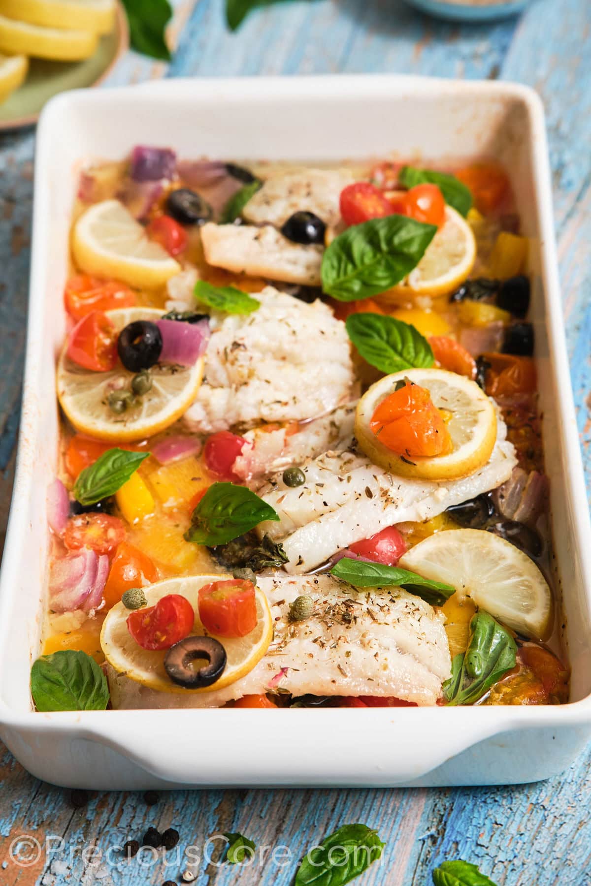 Closeup of baked Mediterranean fish in a pan. 